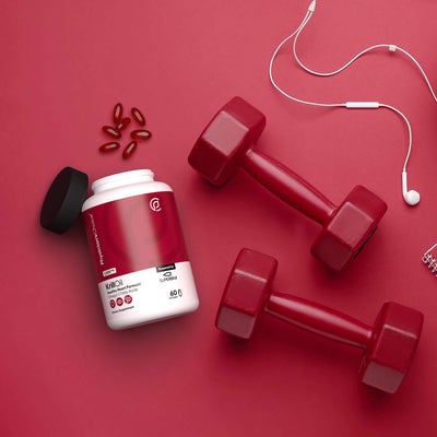 Stylized photo of Physician's Choice Antarctic Krill Oil with Superba2 with weights and headphones